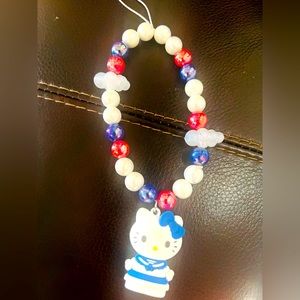 Hanging charm for bag or phone
